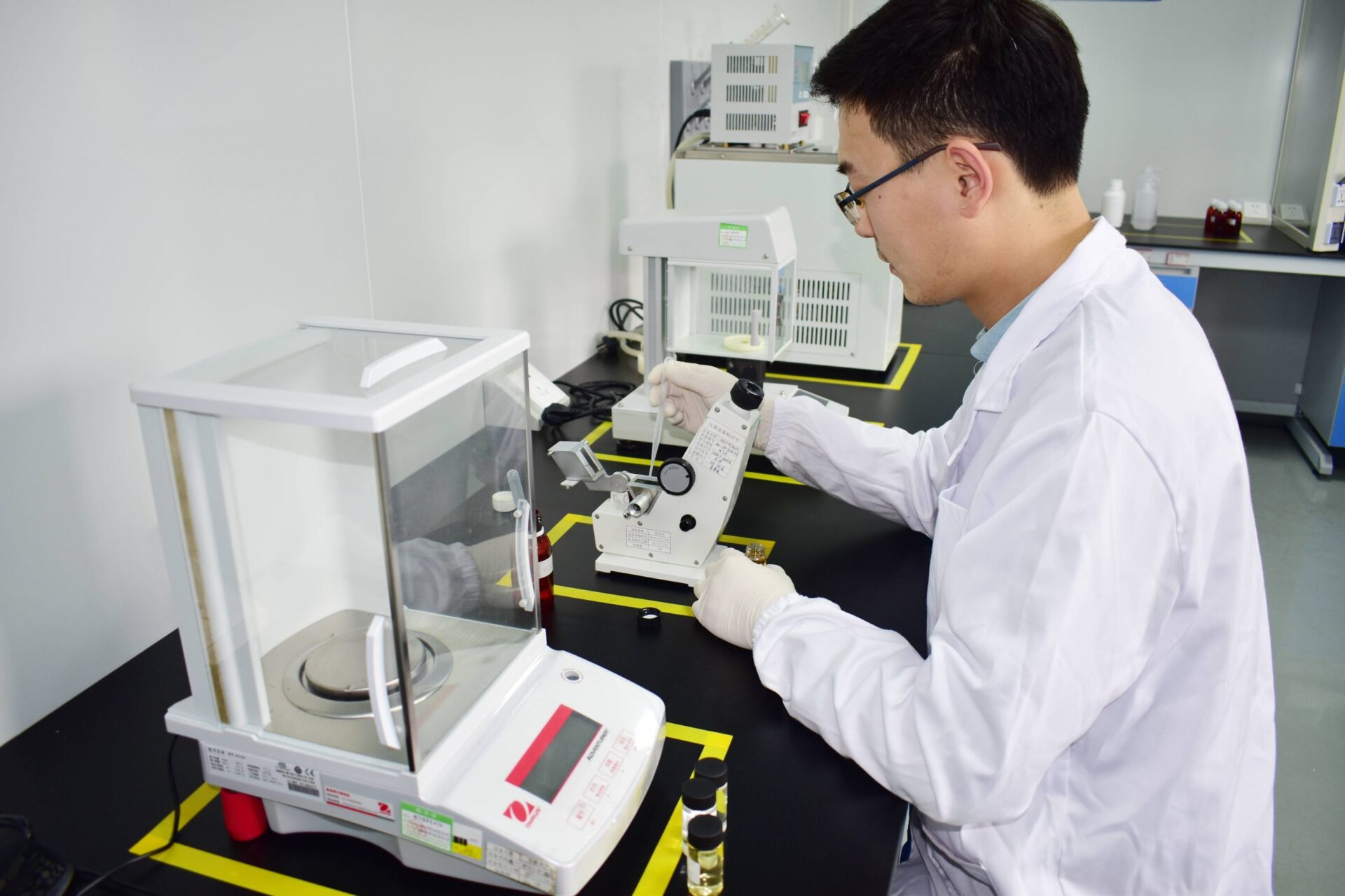 Magical Flavour technician evaluating a liquid flavour sample in the laboratory